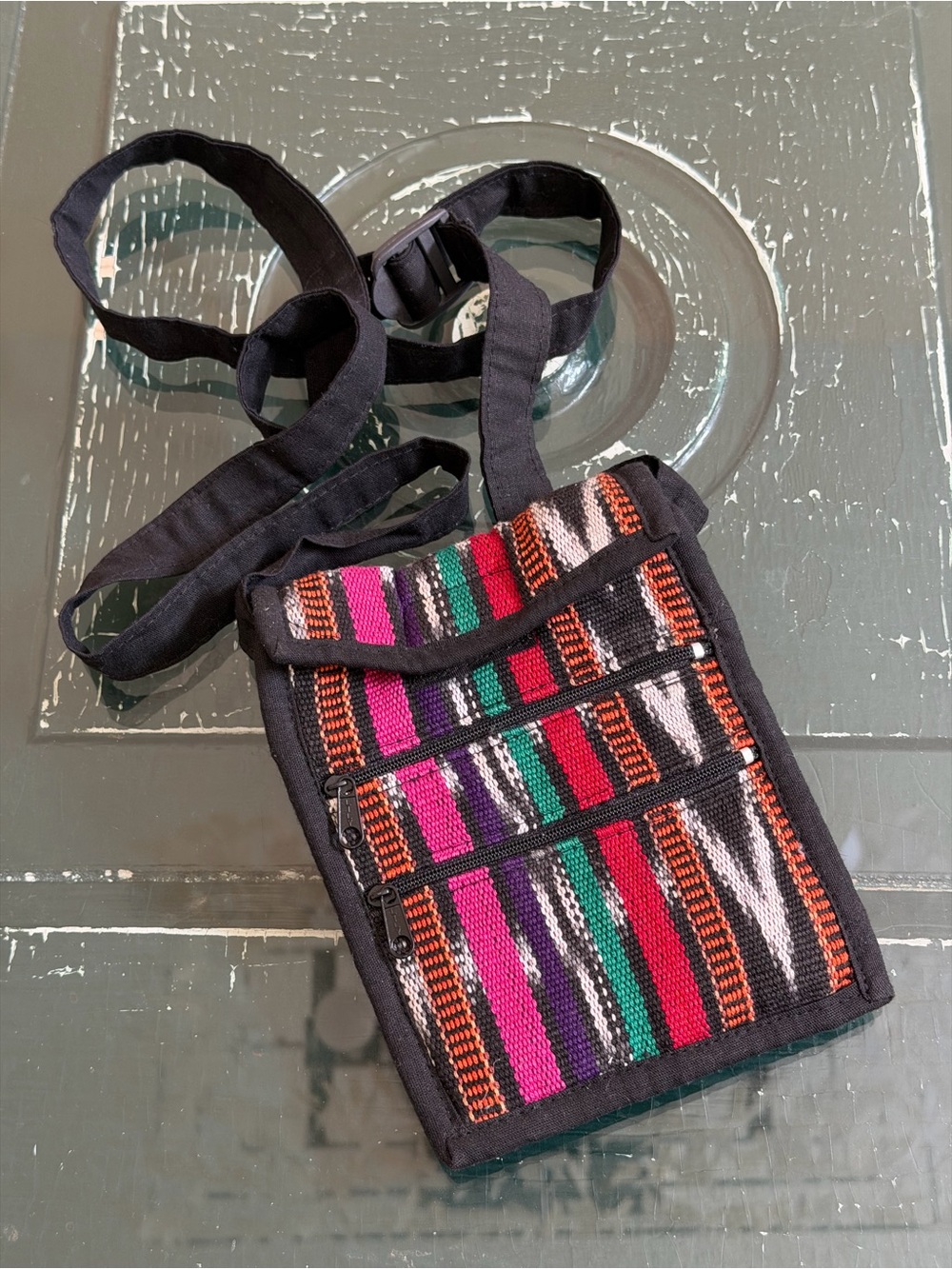 Black Woven Crossbody Bag with Multicolor Stripe Accents